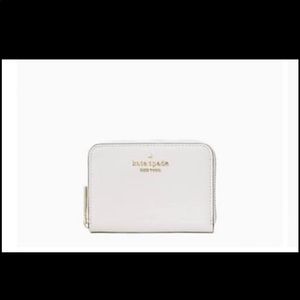 Kate Spade Zip Around Wallet Card Case ( New In original packaging )